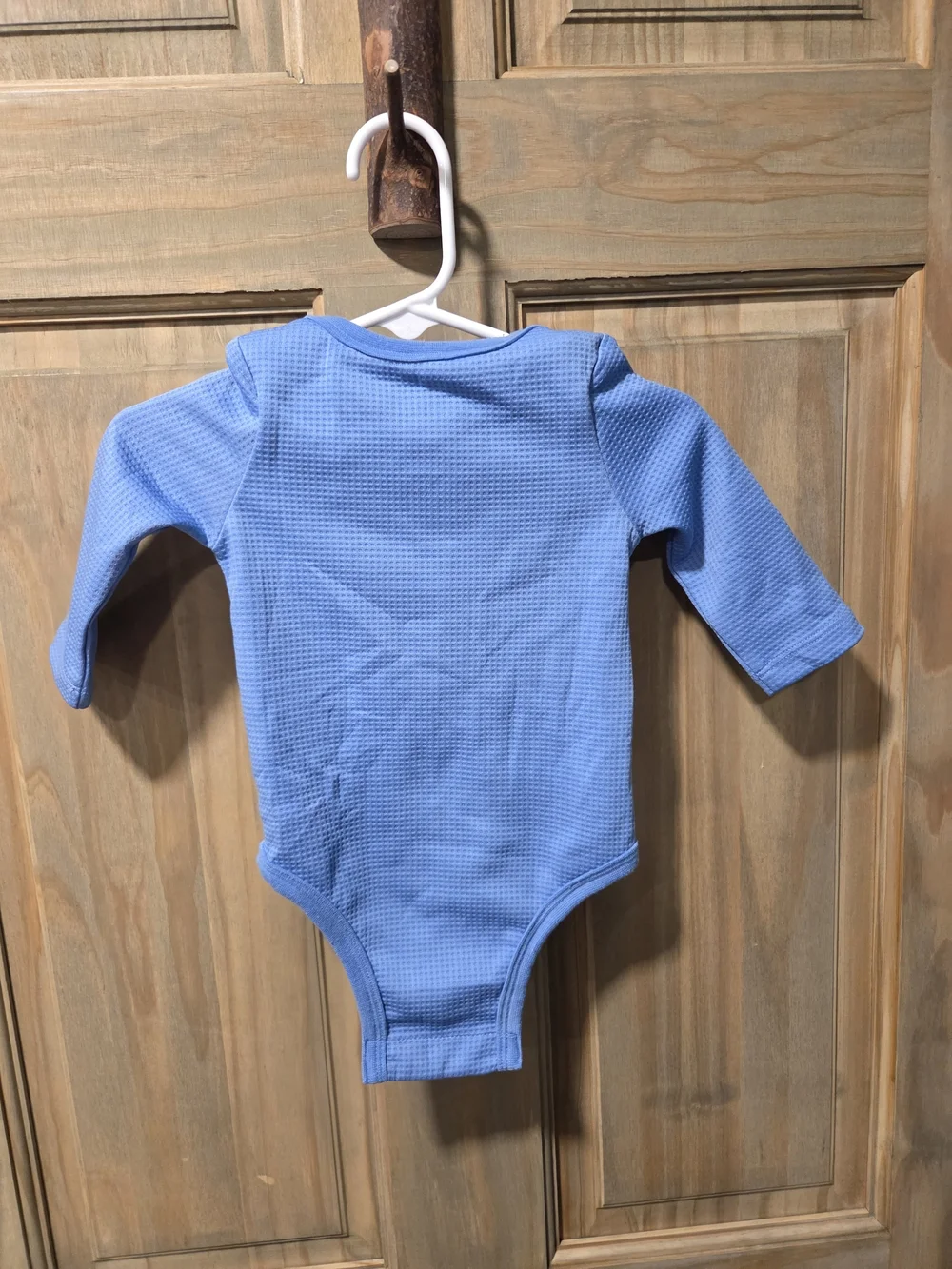 NWOT Nike Light Blue Long-Sleeve Baby Bodysuit with White Logo